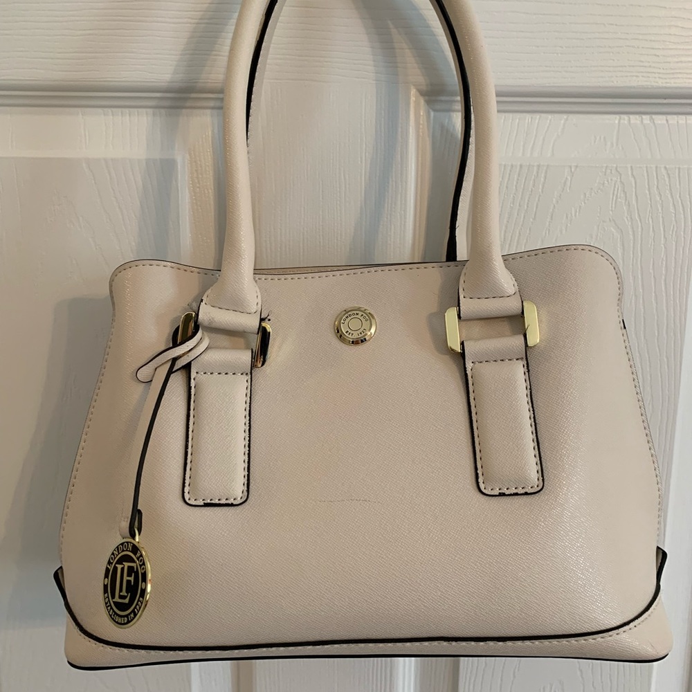 Gently used off white London Fog Satchel with silk print lining.